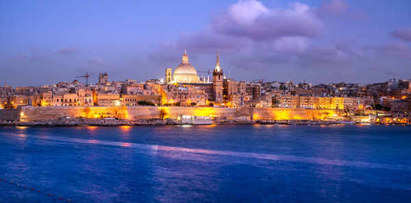 Valletta city, malta, skyline from marsans harbour at blue hour