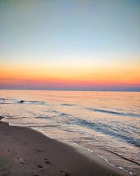 Scenic view of beach during sunset