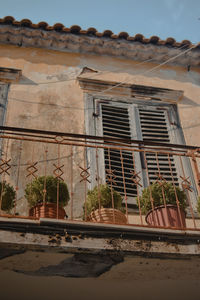 Low angle view of old building against sky