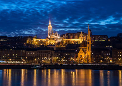 View of illuminated city at night