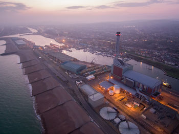 High angle view of river amidst buildings in city