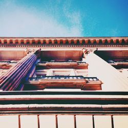 Low angle view of built structure against blue sky