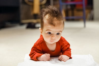 Portrait of cute baby at home