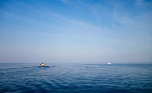 Boats sailing on sea