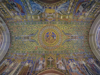Low angle view of ornate ceiling of building