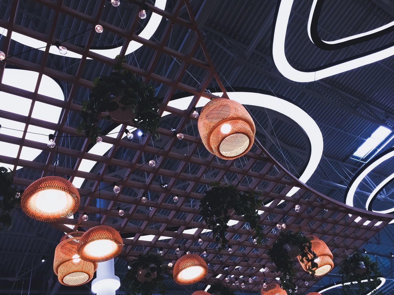 LOW ANGLE VIEW OF PENDANT LIGHTS HANGING ON CEILING