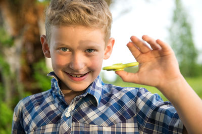 Close-up portrait of boy smiling