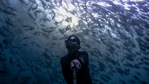 Man swimming in sea