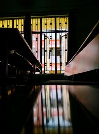 Reflection of bridge on window
