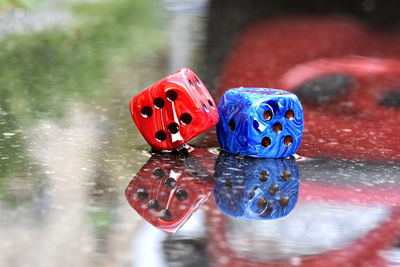 Close-up of multi colored water on table