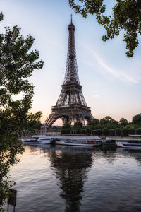 Eiffel tower near the seine river sunrise view in paris, france. famous landmark in paris