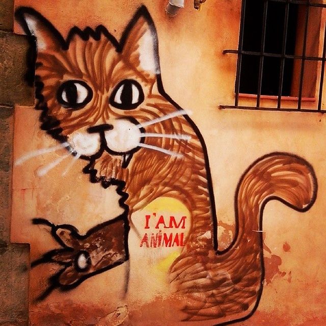 art and craft, art, creativity, graffiti, animal representation, text, wall - building feature, architecture, built structure, building exterior, western script, indoors, no people, human representation, wall, street art, communication, close-up, day