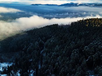 Scenic view of mountains against sky during winter