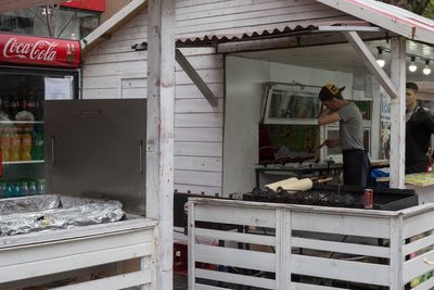 Man working at market stall