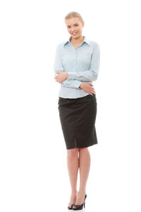 Portrait of a smiling young woman against white background