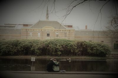 Rear view of a man on the ground