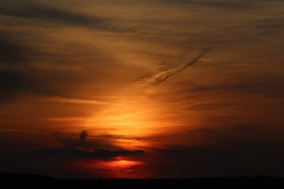 Low angle view of dramatic sky during sunset
