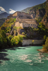 View of castle on mountain against sky