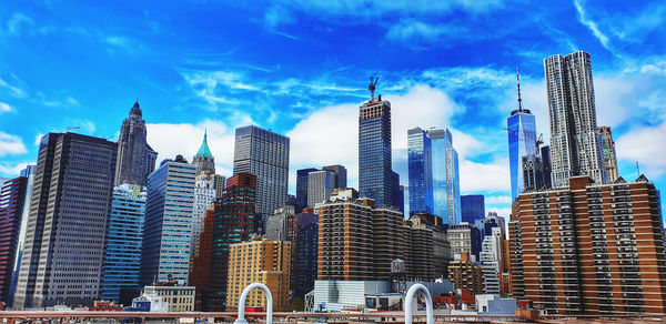 Modern buildings against sky in city