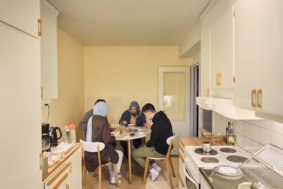 Family eating dinner together at home