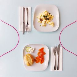 High angle view of food in plates on table