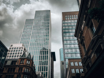 Low angle view of modern buildings against sky