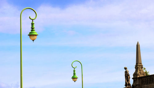 Low angle view of street light against sky