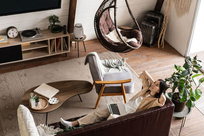 High angle view of empty chairs at home