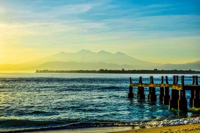 Scenic view of sea against sky at sunset