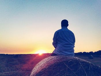 Silhouette of people at sunset