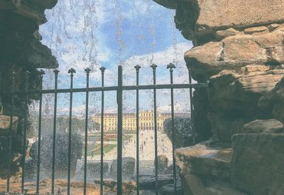 Panoramic view of building seen through glass window