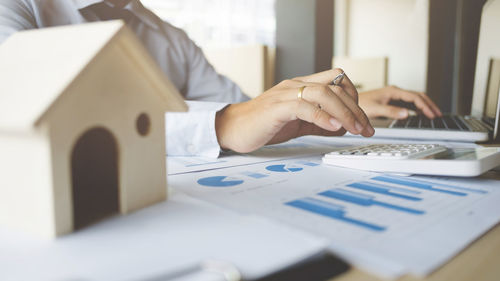 Close-up of businessman working in office