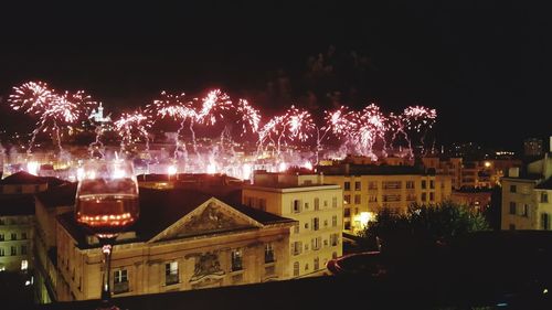 Firework display at night