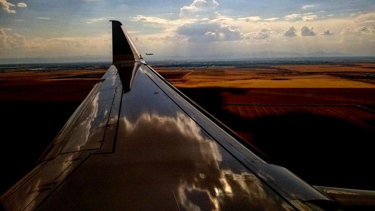 REFLECTION OF CLOUDS IN SKY