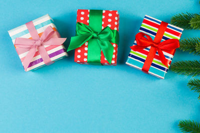 Christmas decorations on paper against white background