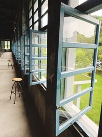 Empty chairs and tables in building