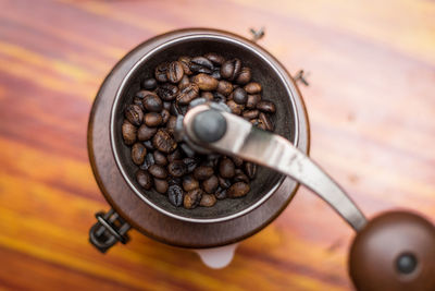 High angle view of roasted coffee beans on table