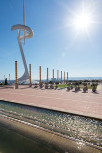 Street light against sky on sunny day
