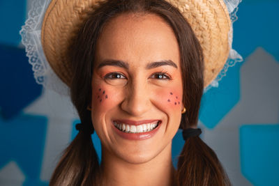 Close-up of woman wearing hat