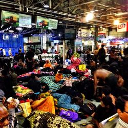 People at market stall