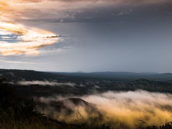 Scenic view of landscape against sky during sunset