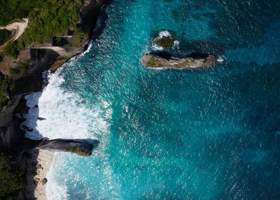 High angle view of man swimming in sea