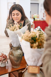 Beautiful woman with pink flower