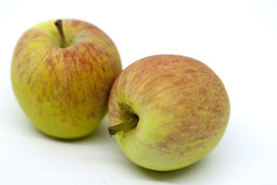 Close-up of apple against white background