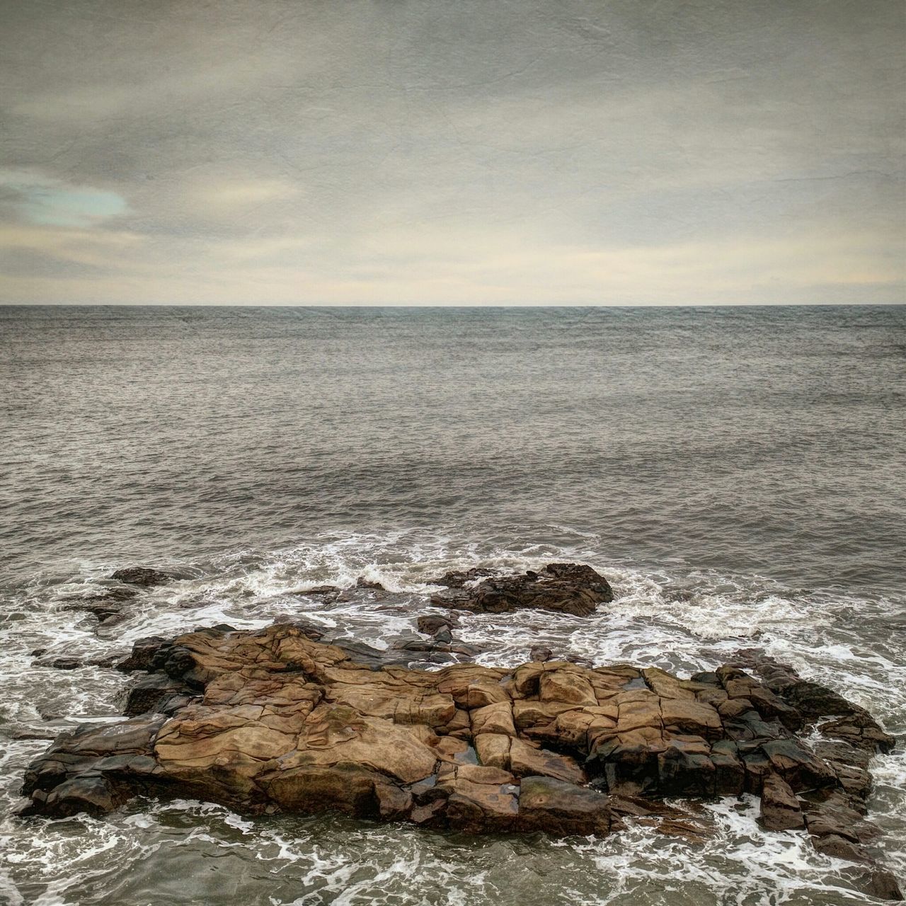 sea, water, horizon over water, scenics, sky, beauty in nature, tranquil scene, tranquility, wave, nature, rock - object, cloud - sky, idyllic, waterfront, seascape, surf, beach, shore, rippled, remote