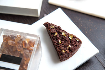 High angle view of chocolate cake in plate on table