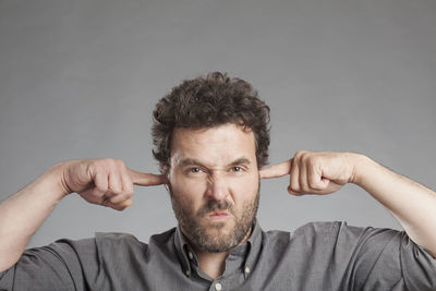 Portrait of man against white background