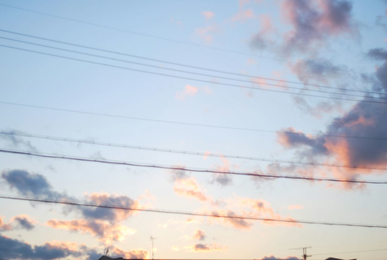 power line, sky, cable, cloud - sky, electricity pylon, power supply, electricity, low angle view, cloudy, connection, sunset, tranquility, cloud, scenics, beauty in nature, tranquil scene, power cable, nature, fuel and power generation, silhouette