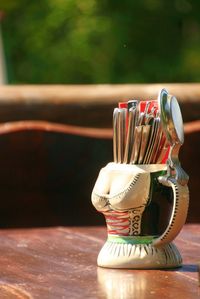 Close-up of spoons on table at restaurant