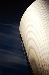 Low angle view of illuminated built structure against sky